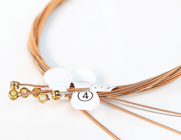 Cordes de guitare folk en acier rond 1-2, durables et réactives, pour un son clair et brillant.